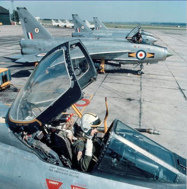 #44 English Electric Lightning F6 fighters of No. 11 Squadron prepare for take-off at RAF Leuchars in Fife, 1965