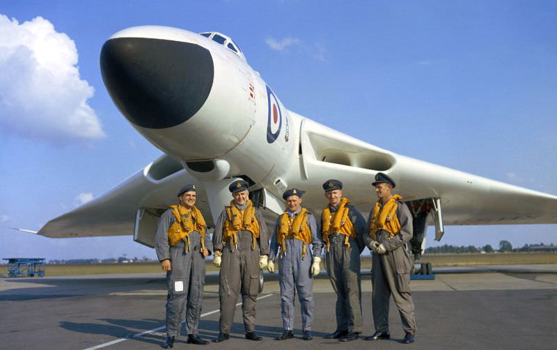 #2 The crew of an Avro Vulcan B.1 bomber pose in front of their aircraft, 1956