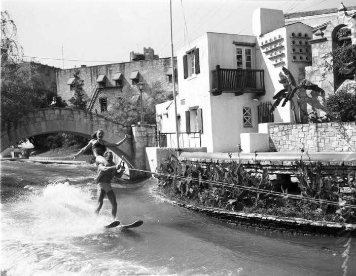 #10 Buzzy Mueller & Mimi Williams water skiing on the San Antonio River at the Arneson River Theater, 1925