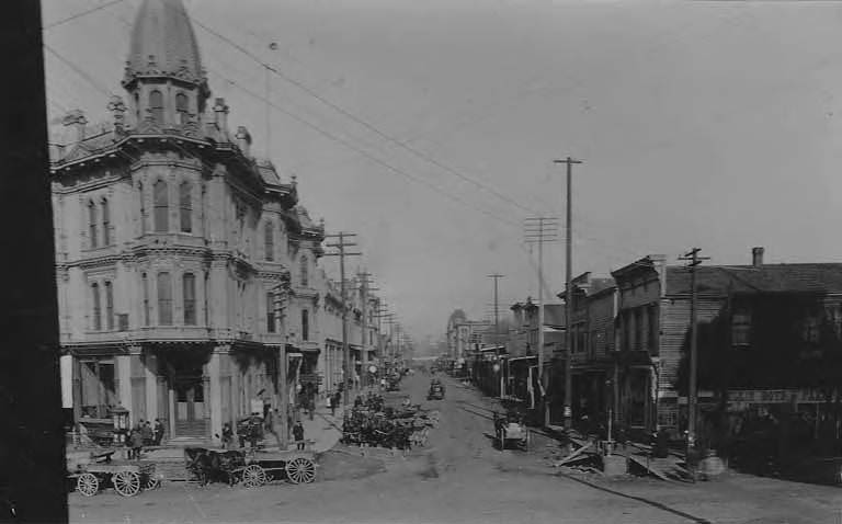#136 Front Street (now 1st Ave. S.) looking north from James Street, 1897