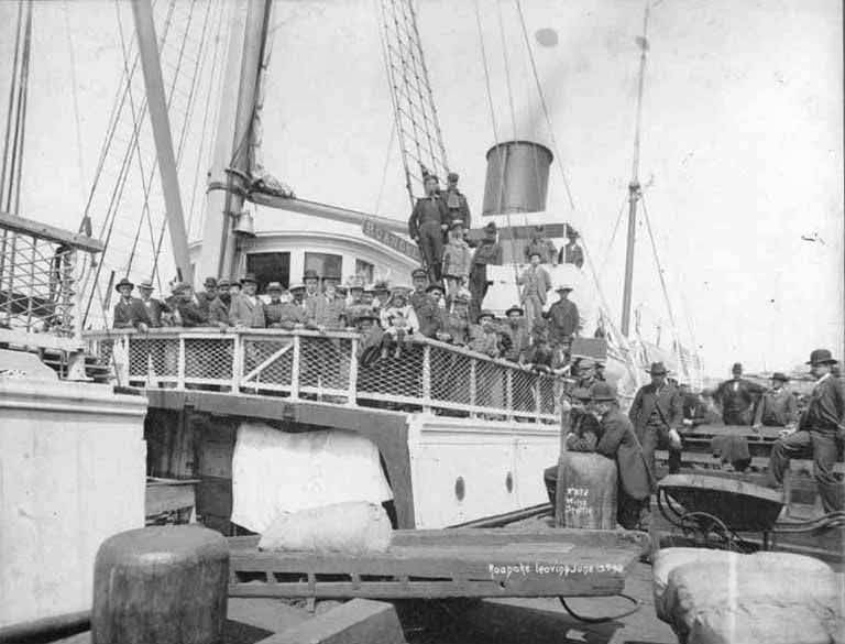 #156 Passengers aboard the steamer Roanoke leaving for the Klondike from a Seattle dock, June, 1898