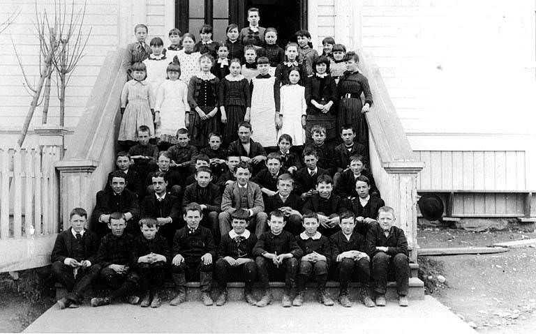 #12 Central School, children and teachers posed on steps, 1870