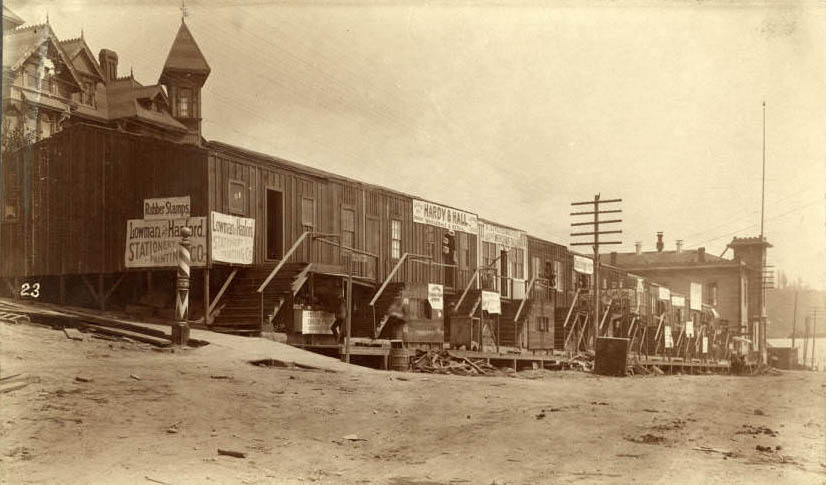 #104 Temporary buildings at 3rd Ave. and James St. following fire, June 1889