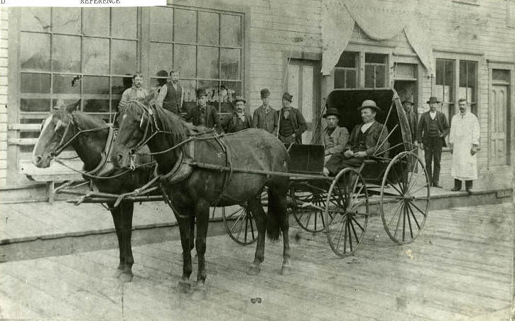 #216 Hans and Nels Nelson at corner of Dock Pl. and Ballard Avenue, 1892