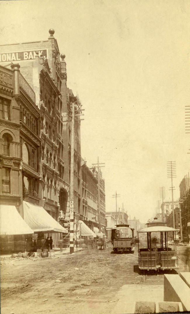#117 View of reconstruction following fire from 1st Ave. and James Street, July 1890