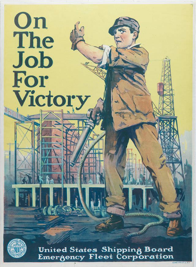 #35 A shipyard employee lifts an arm into the air while holding a tool