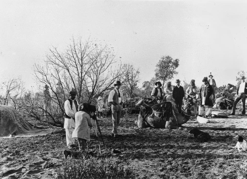 #9 Camels and their Afghan drivers loaded with goods for the treck between Bourke and Cunnamulla, 1895