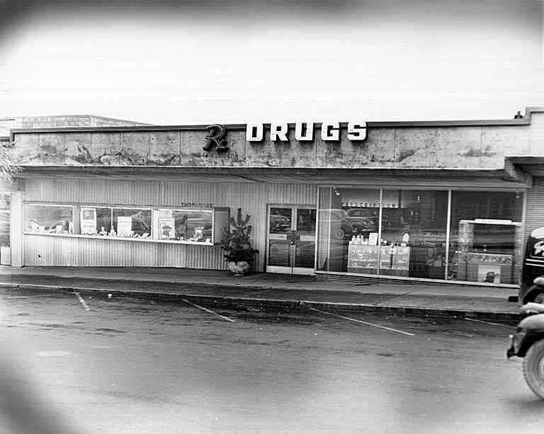 #26 Front exterior of Thompson’s Drugs, Bellevue, 1947
