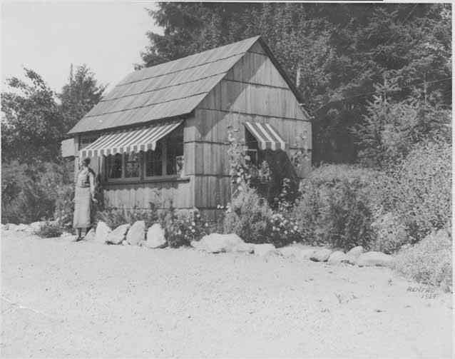 #22 Mina Mary Schafer outside Jane McDowell’s Candies, Bellevue, 1934