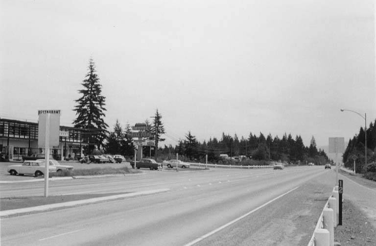 #59 U.S. 10 highway, two-way left turn lane near SE 36th St., showing pavement markings and sign installation, 1960s
