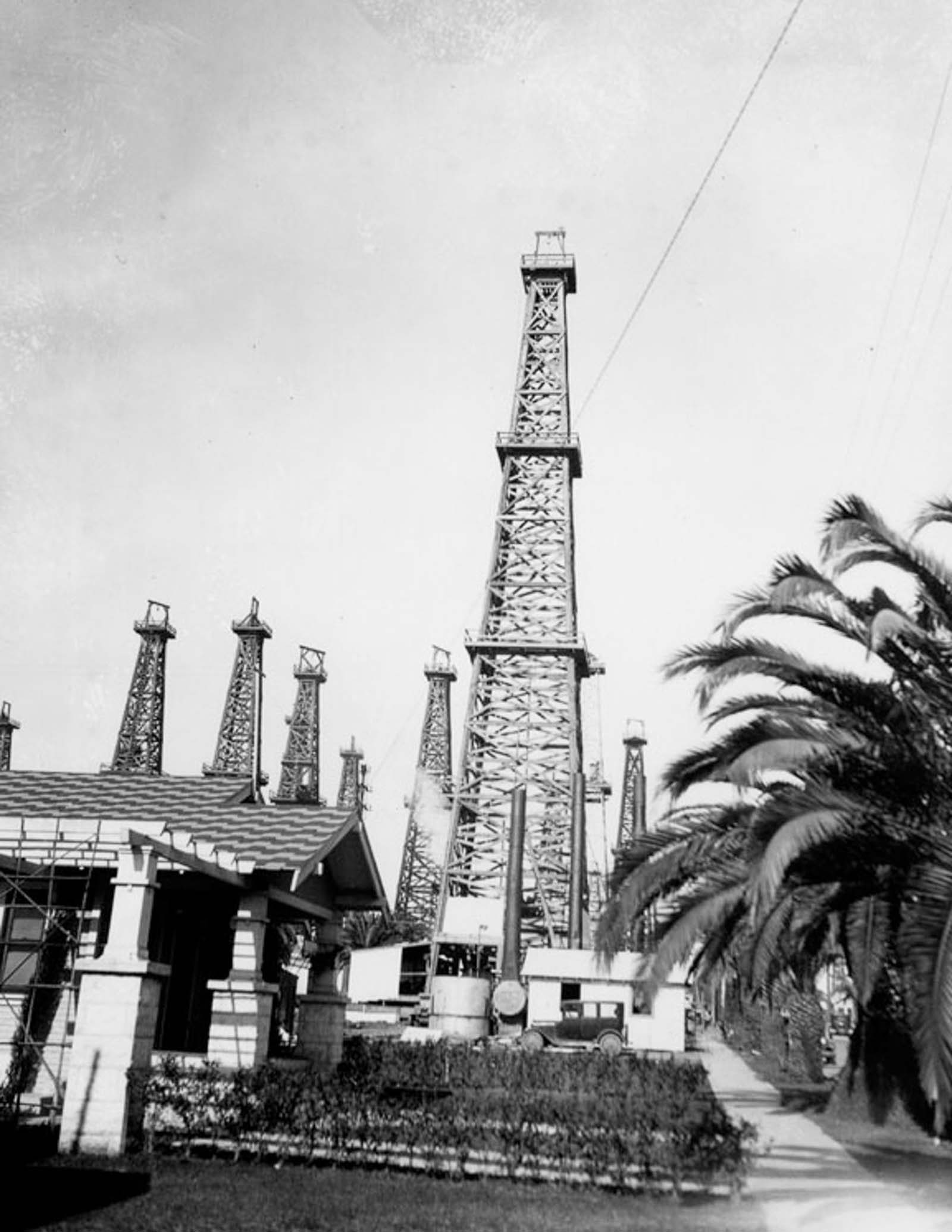#22 A Long Beach home with oil derricks nearby, 1929.