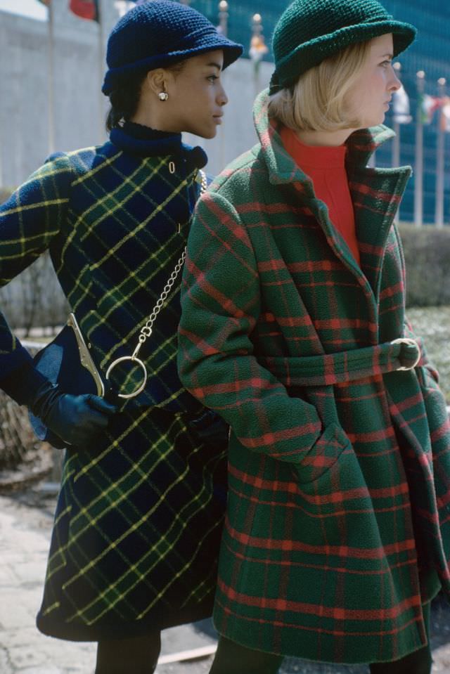#28 Model on the left is wearing a blue and green plaid wool suit by Louis Clausen.