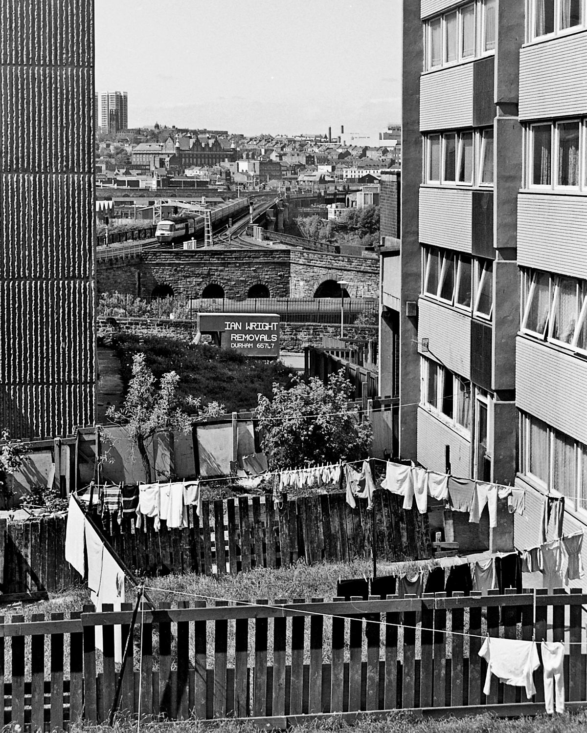 #29 Washing day for some in St. Cuthbert’s Village in 1986 as an HST comes over the bridge from Newcastle.