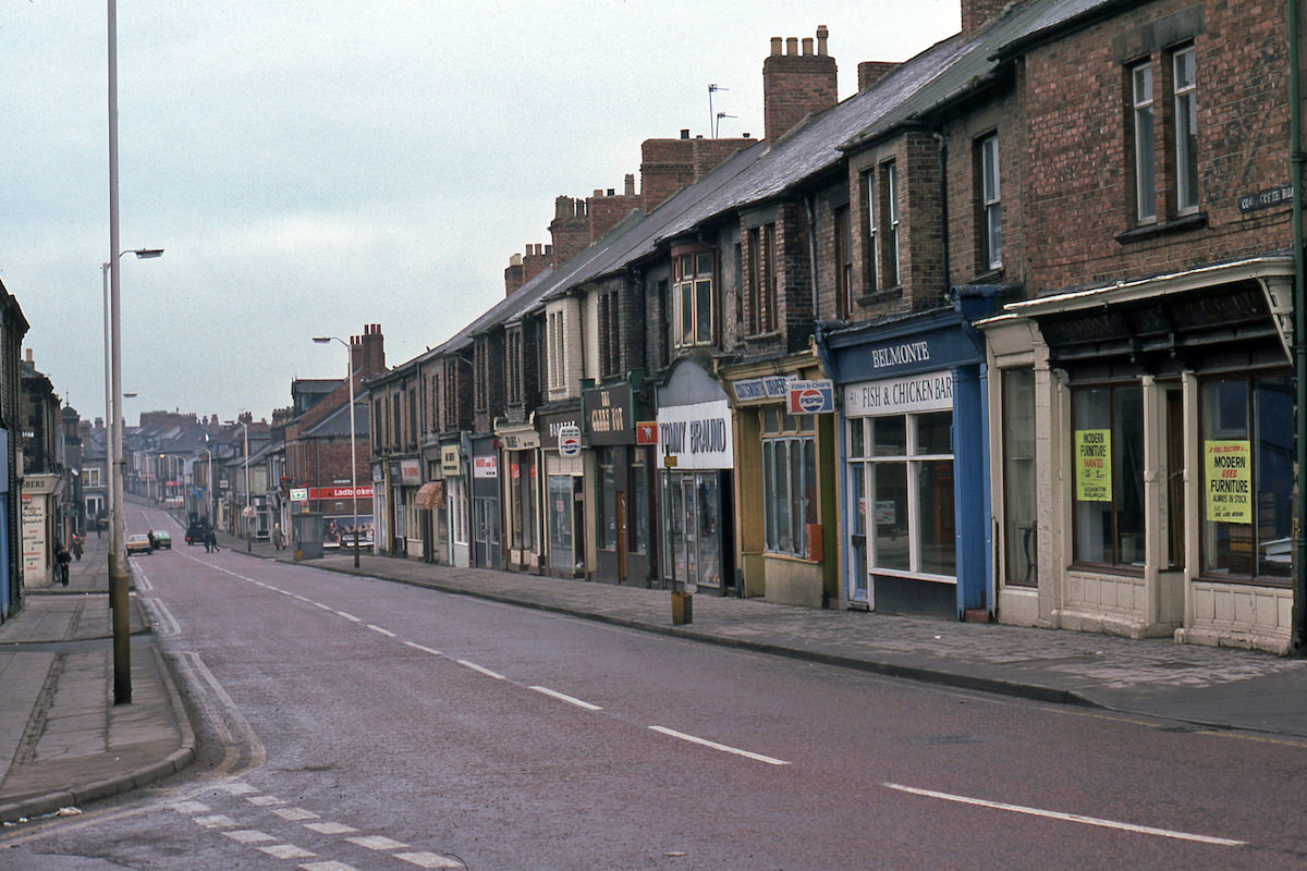 #38 Looking south along a weirdly-deserted Coatsworth Road in 1980.