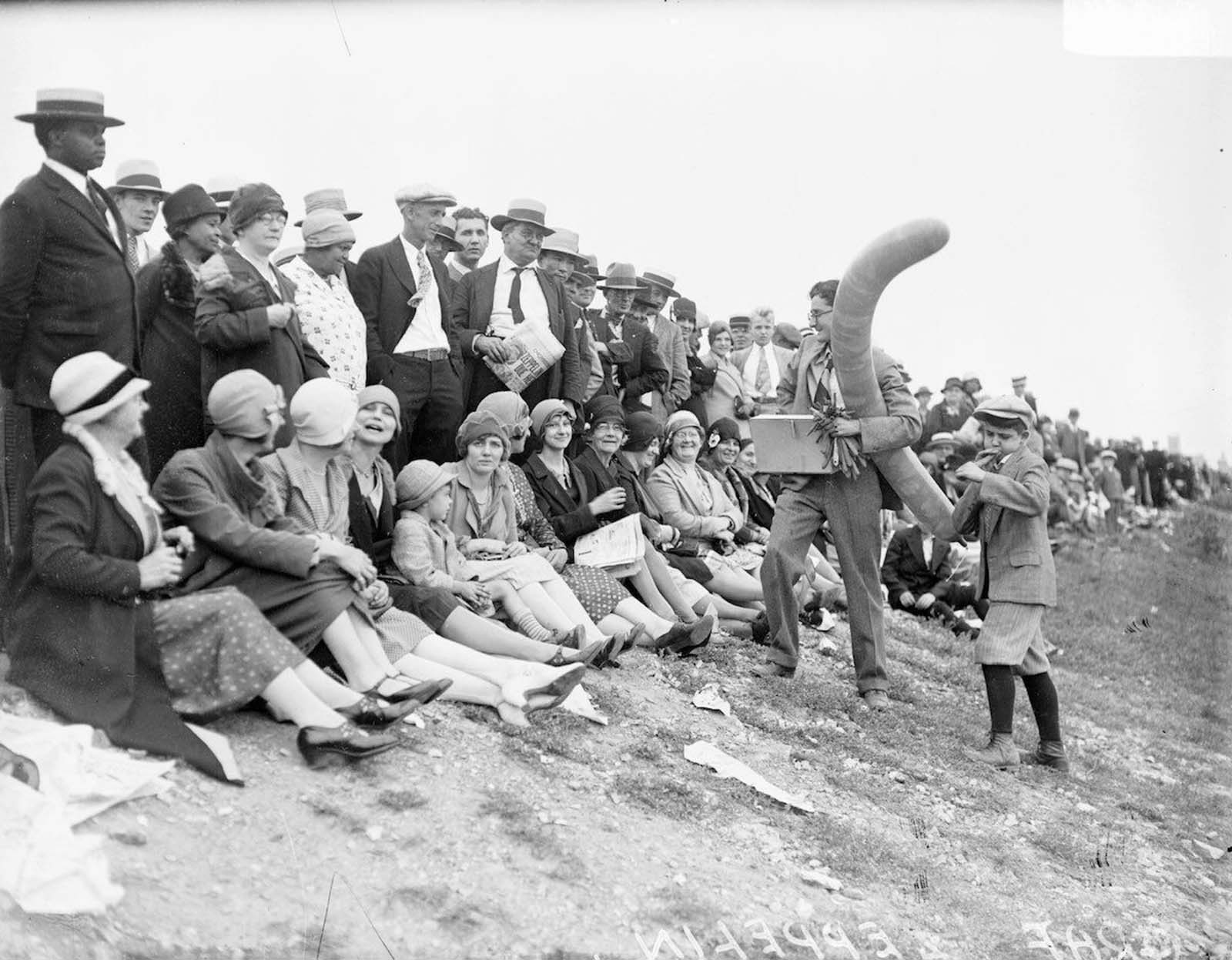 #3 An enterprising balloon salesman sells balloons vaguely modeled on the Zeppelin’s shape.