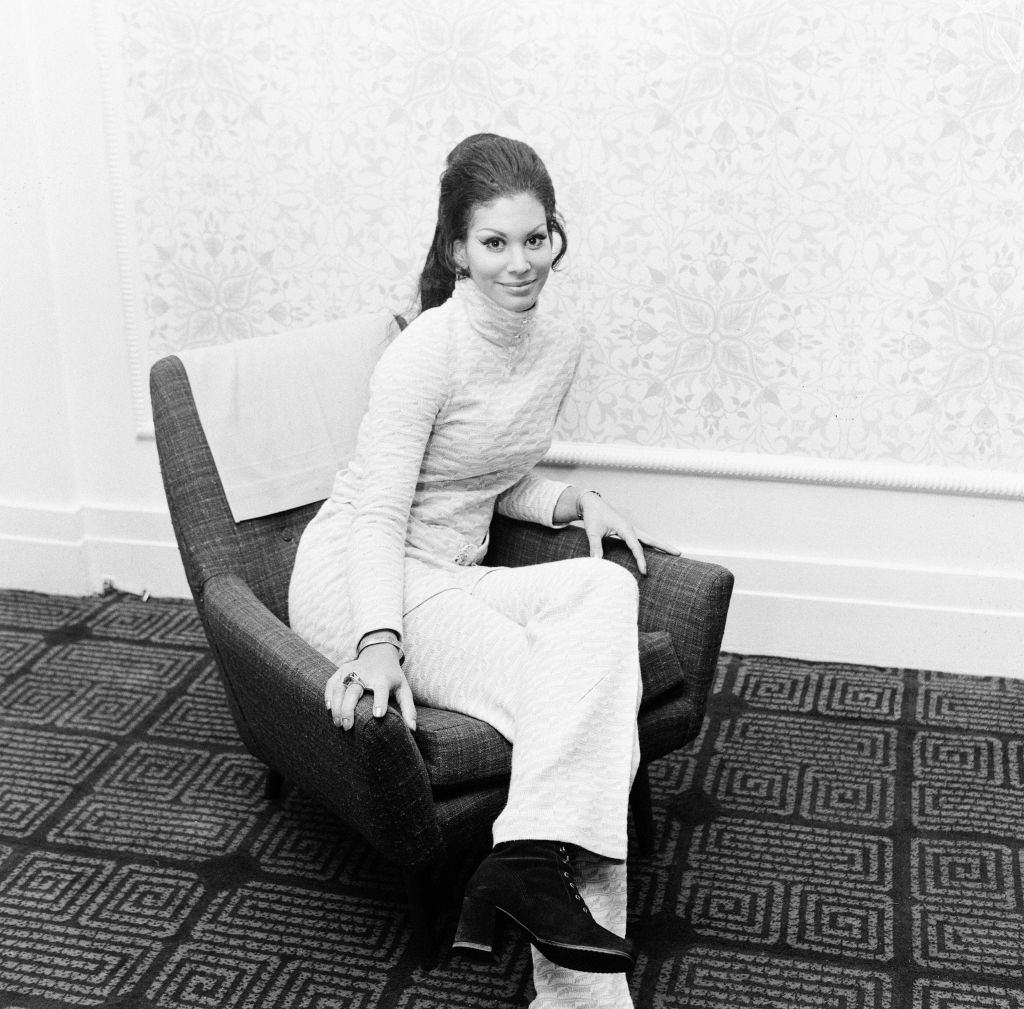 #1 Jennifer Hosten Posing on the sofa in Newcastle, 1970