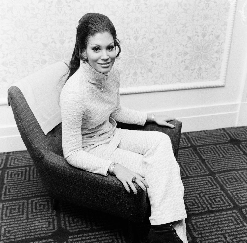 #5 Jennifer Hosten Posing on the sofa in Newcastle, 1970