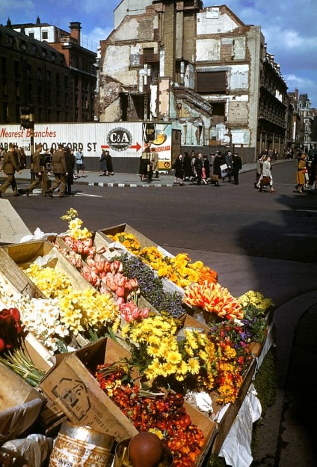 #19 Life goes on in London despite the destruction caused by German air raids, 1941