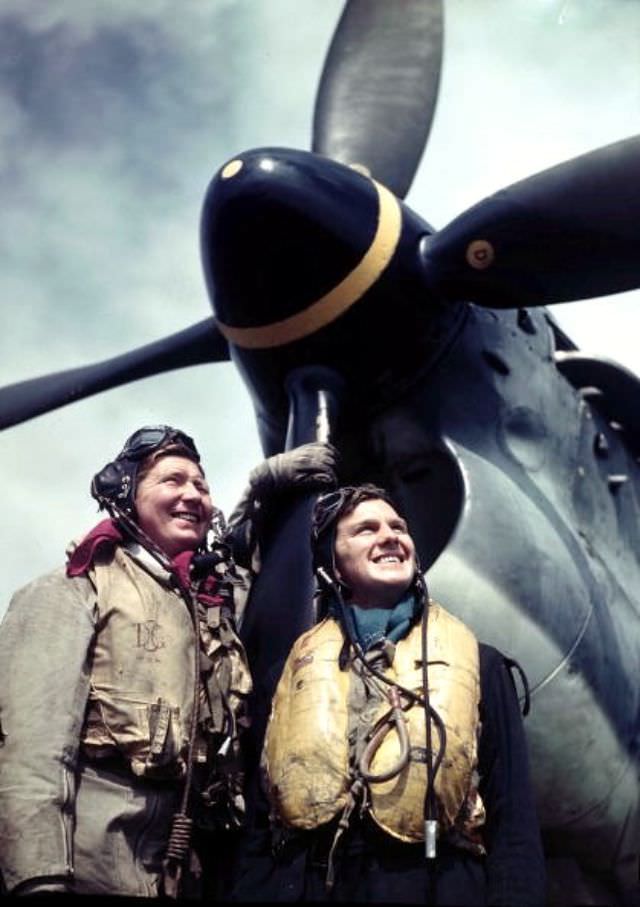 #20 Two training Barracuda Bomber Pilots standing next to their aircraft, July 1944