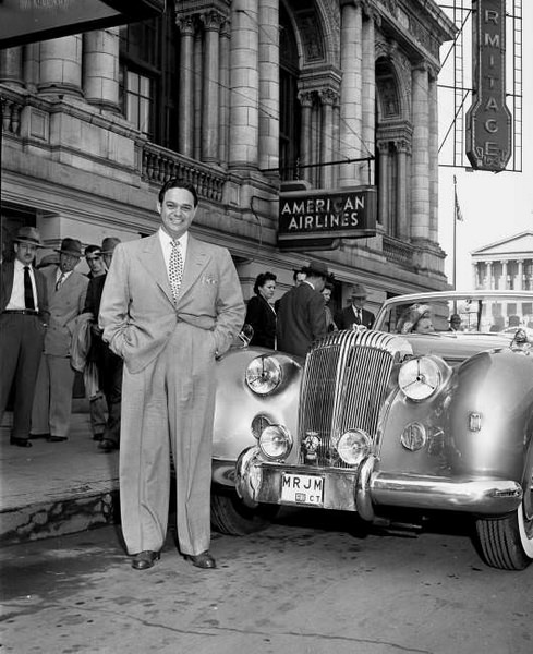 #62 James Melton arrives with his English car, 1951