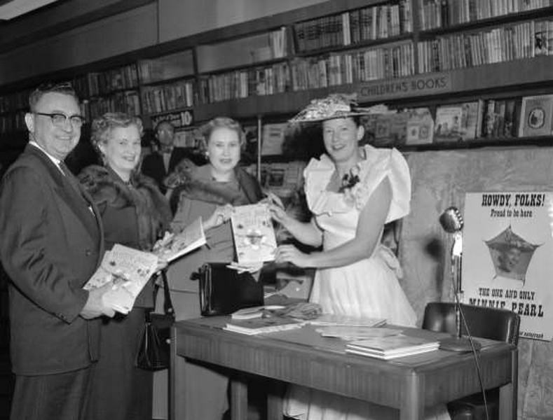 #75 Minnie Pearl with Jim Perkins and others at Zibart’s Book Store, 1954