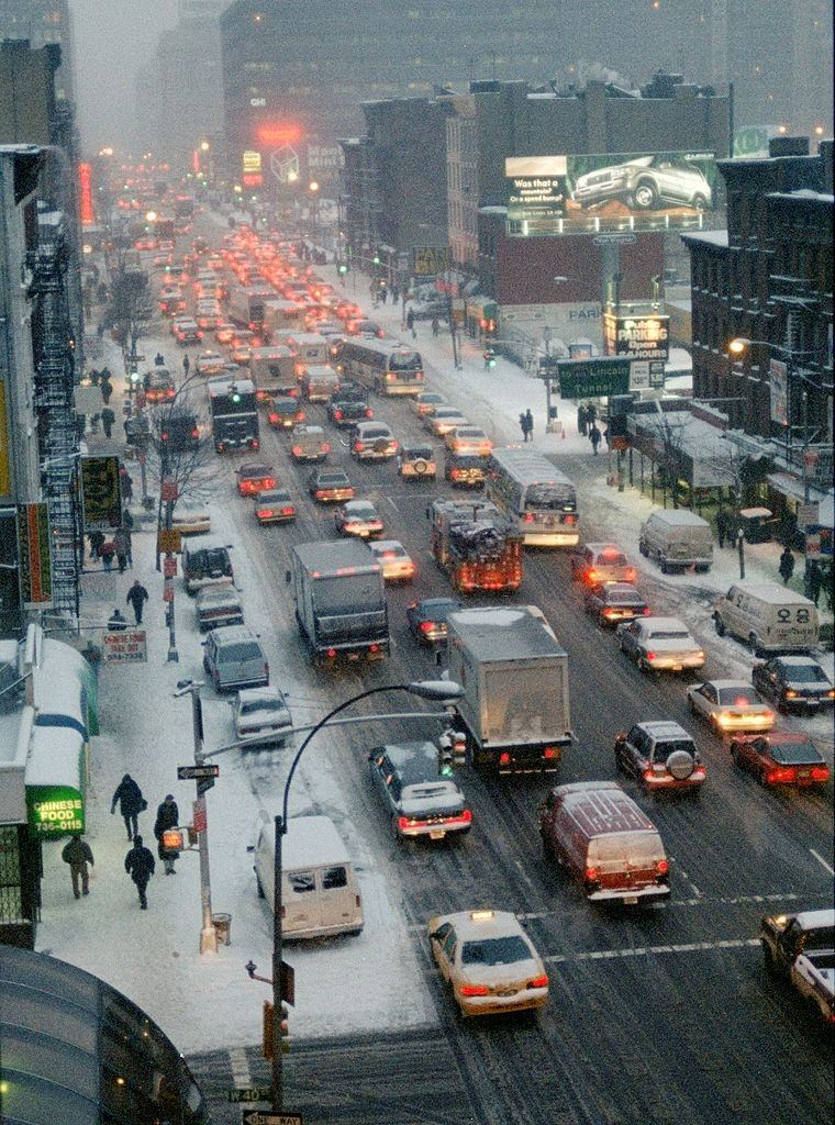 #100 Traffic heading down Ninth Ave. after a snow storm which complicated the evening commute.