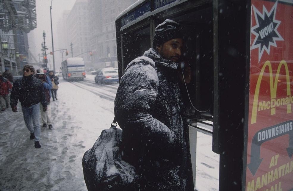 #3 Man in Snow-Covered Coat Talking on Pay Phone, New York City, 1996