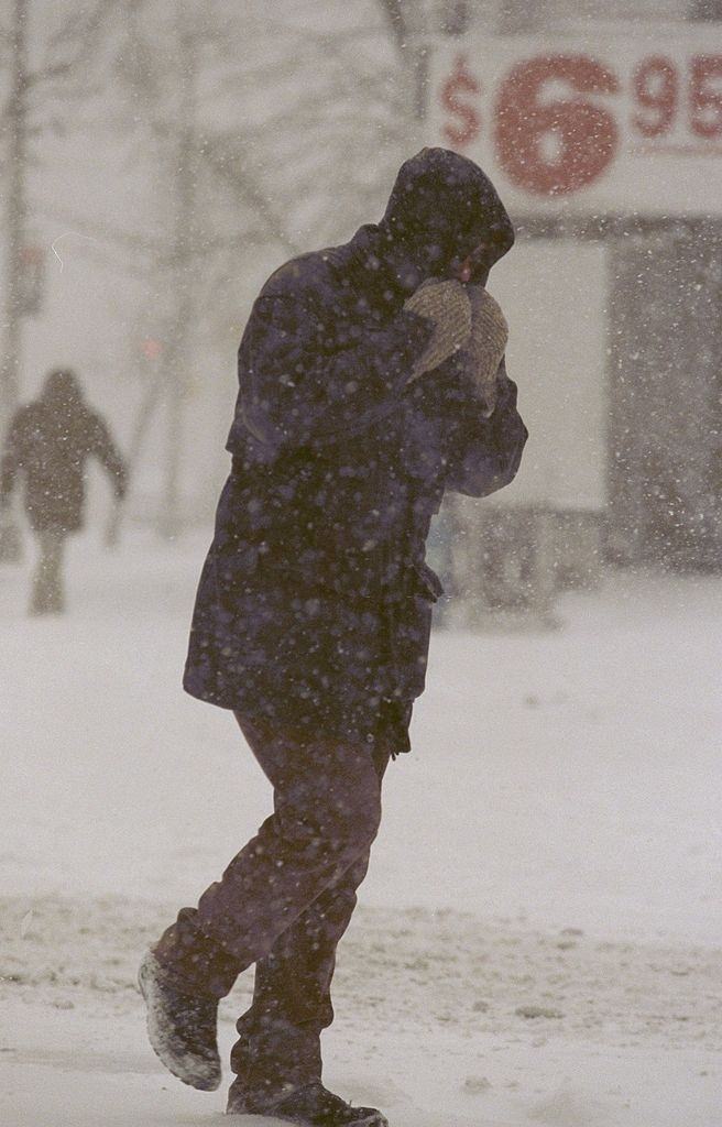 #51 Pedestrian makes his way across W. Broadway during a blizzard, New York City, 1996
