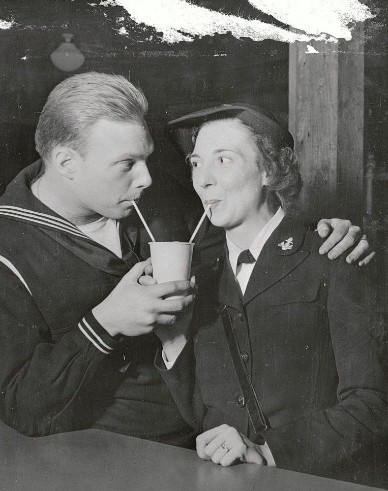 #22 Reunited Husband and Wife Sharing Soda, 1944
