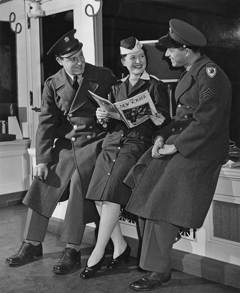 #24 American servicemen with a smiling young woman in the canteen at Pennsylvania Station, New York City, 1943