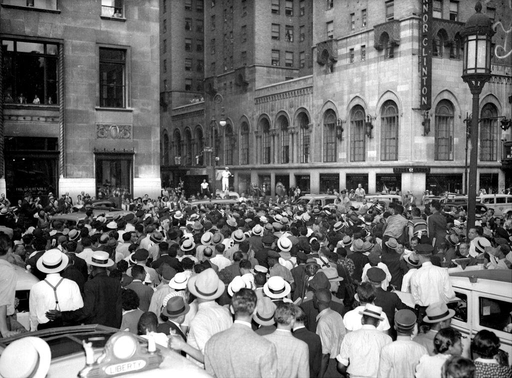#51 Crowd outside Pennsylvania Station wait to see Scottsboro boys, 1940