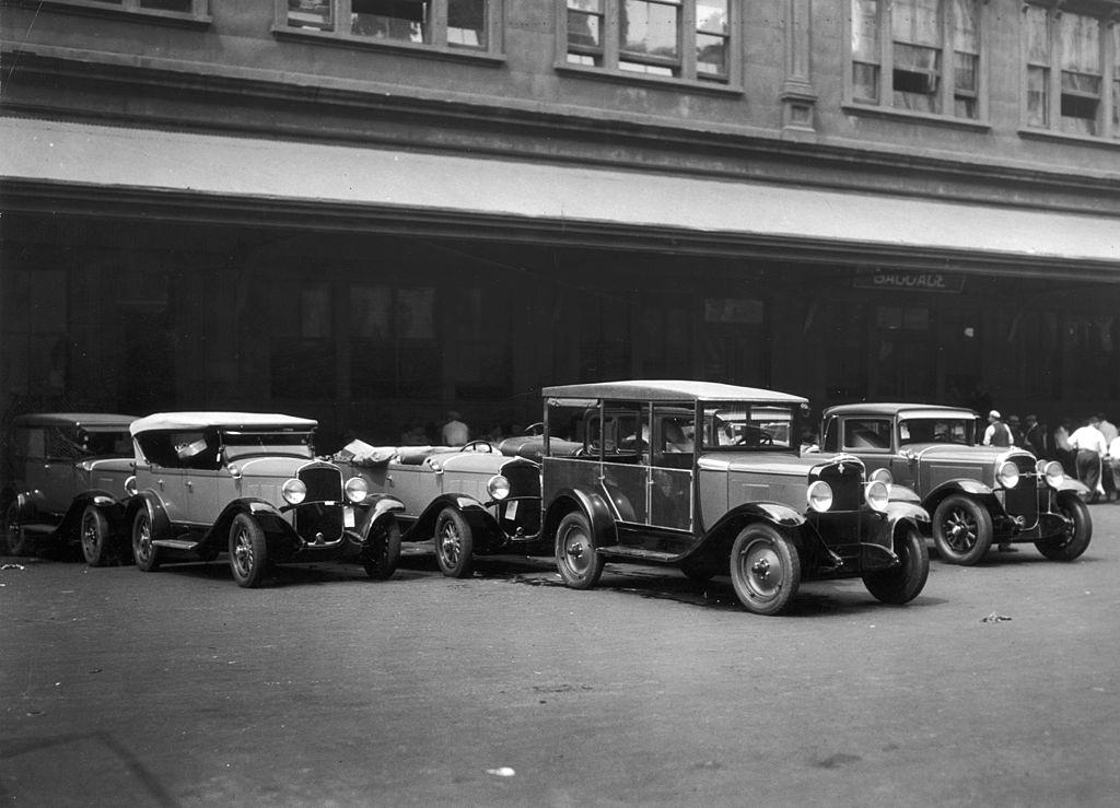 #56 A group of cars parked outside of Pennsylvania Railroad Station, 1935