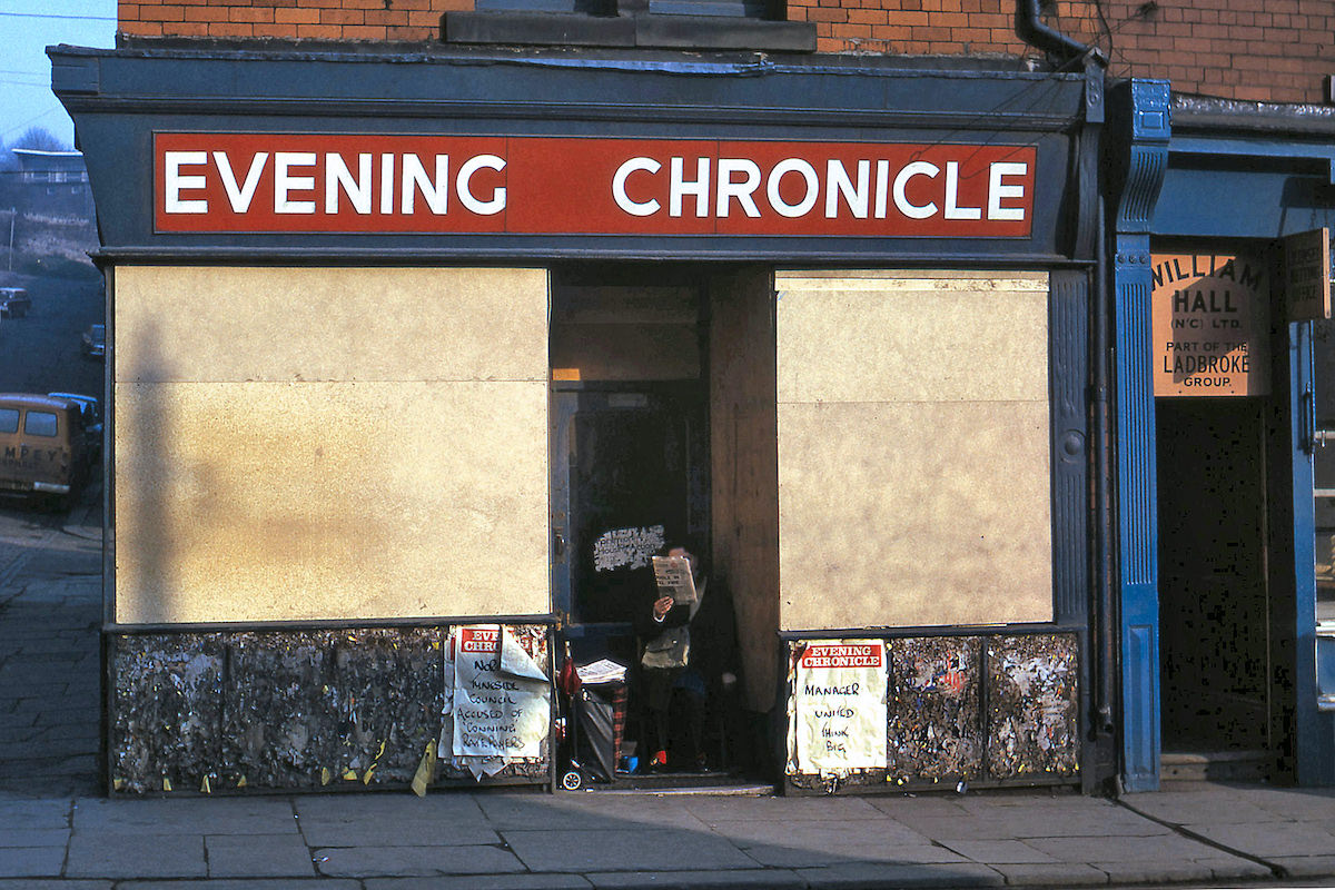#18 The ‘Evening Chronicle’ seller in an apt sheltered spot in Byker in 1975.
