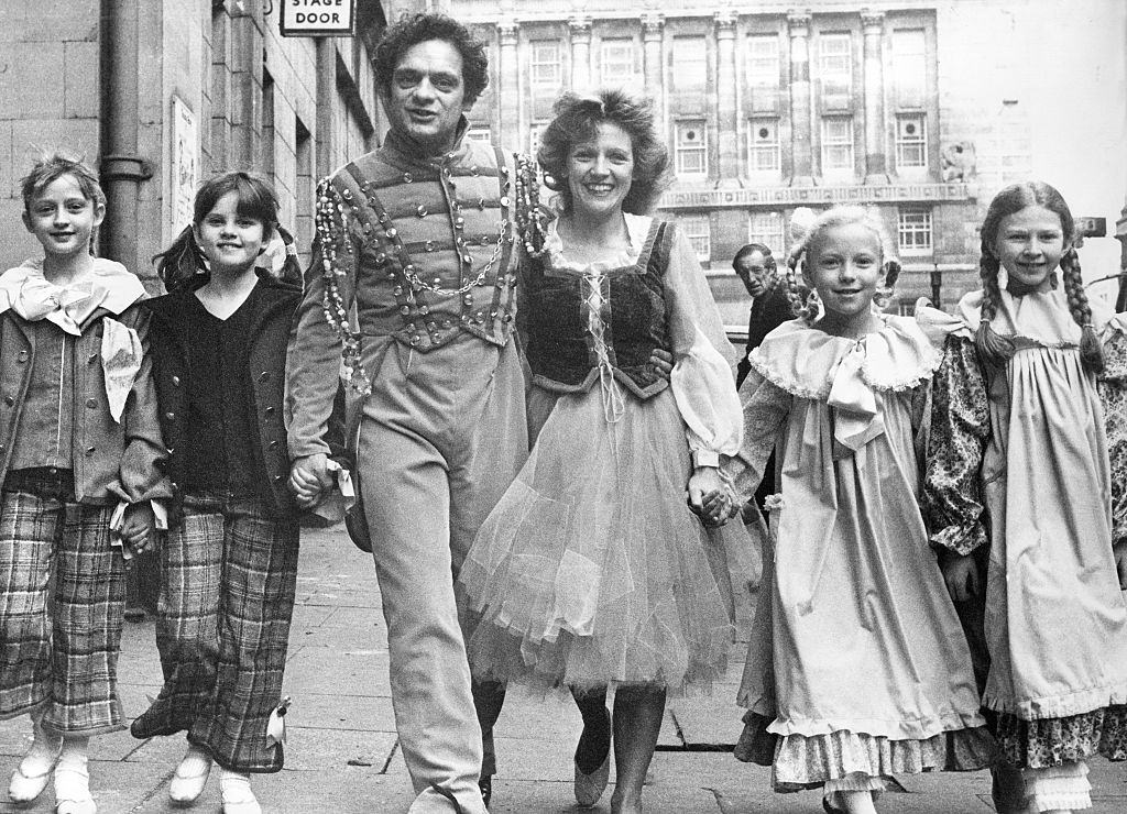 #46 David Jason and Leah Bell who are in the pantomime Cinderella at the Theatre Royal, Newcastle with four of the choldren, 1970s