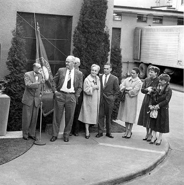 #26 Dedication ceremony for Peter G. Schmidt memorial plaque with sculptor John W. Elliott at microphone, Olympia Brewing Company, 1958