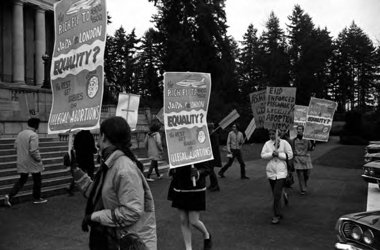 #9 Demonstrators holding signs at abortion rights rally in Olympia, 1970