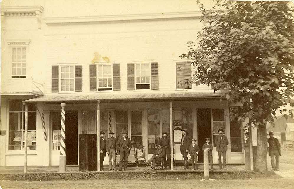 #21 A storefront identified as the Isaac V. Mossman store, Olympia, 1870
