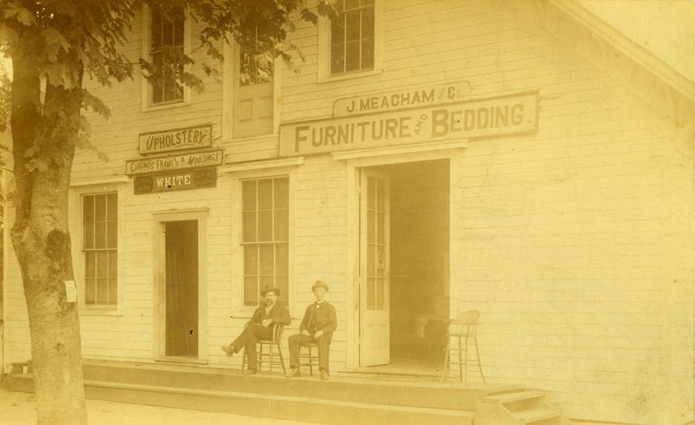 #28 John Meacham Furniture on West side Columbia Street between State & Fourth, Olympia, 1870