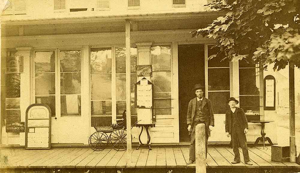 #35 A storefront identified as the Isaac V. [Van Dorsey] Mossman store, Olympia, 1870