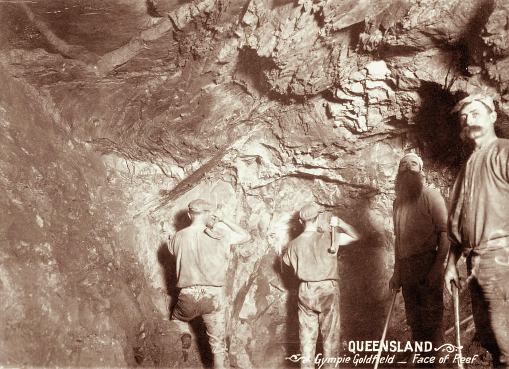 #104 Four miners at face of reef in Gympie Goldfield, 1897