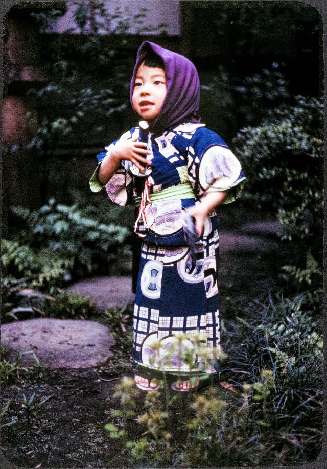 #123 Little girl in a kimono and head scarf
