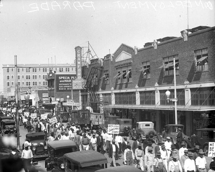 #100 Parade of unemployed workers, on W. Houston Street, on way to City Hall, San Antonio, 1930s