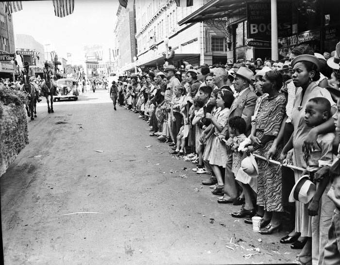 #184 Crowd on Broadway near Houston watching 1937 Battle of Flowers Parade, 1937