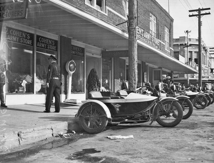#186 Police patrol sidewalk after removing pickets during strike at Shirlee Frocks, Inc., 109 S. Pecos Street, San Antonio, 1937