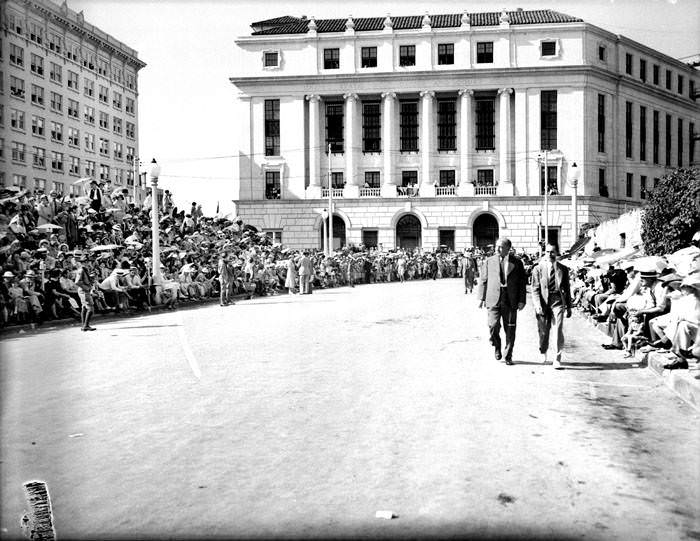 #190 Looking north from Alamo Plaza to Post Office for 1937 Battle of Flowers Parade, 1937