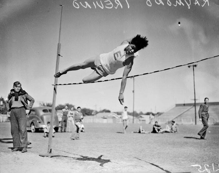 #213 Raymond Trevino high jumping, 1939