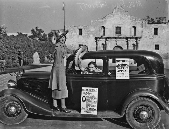 #46 Mrs. Ray Elliott and Mrs. Albert Robey in car in front of the Alamo, 1937