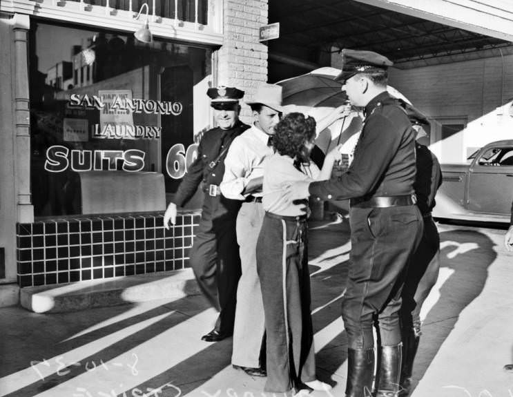 #18 Police arresting Aurora Vallejo during the San Antonio Laundry Strike, 1937