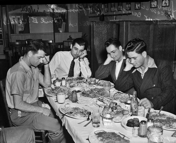 #27 Italian American members of San Antonio Missions eating spaghetti, 1939