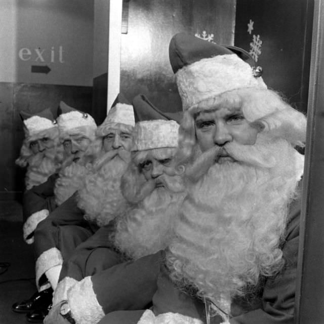#7 Group of Santa Claus mascots inside the Macy’s department store, 1948. (Nina Leen)